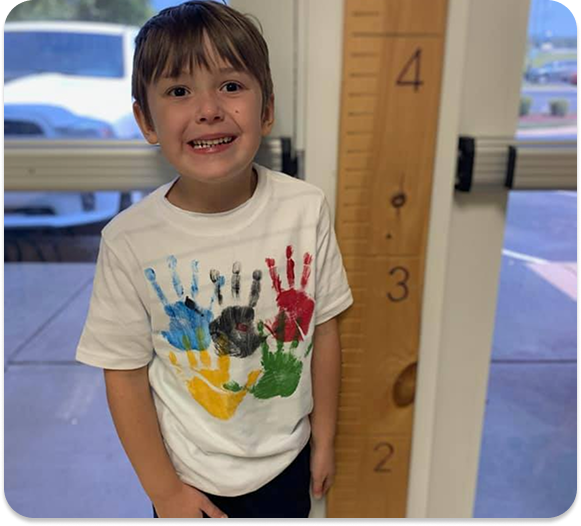 little boy is smiling